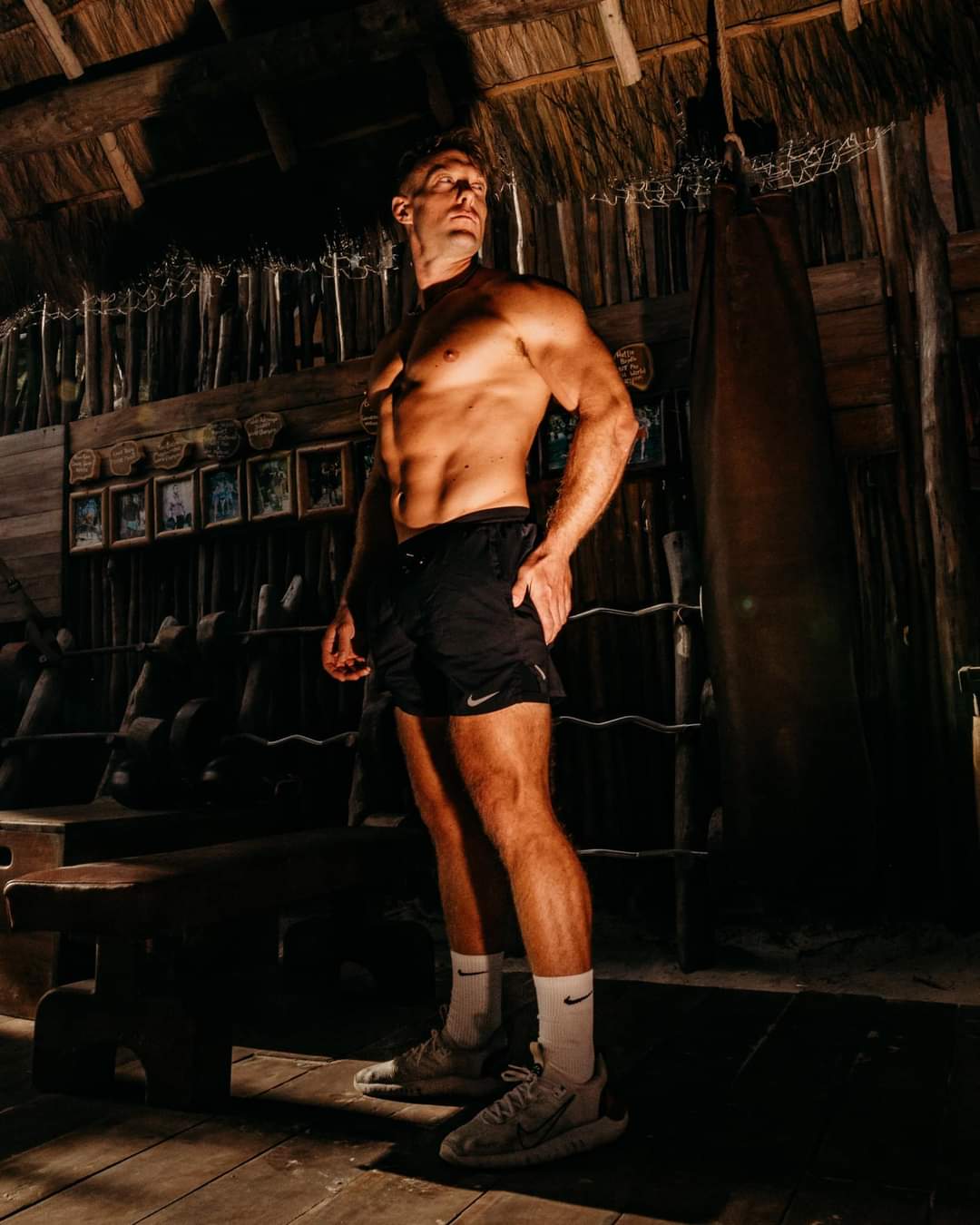 Mike Zdonczik standing in a palapa-roofed open-air gym