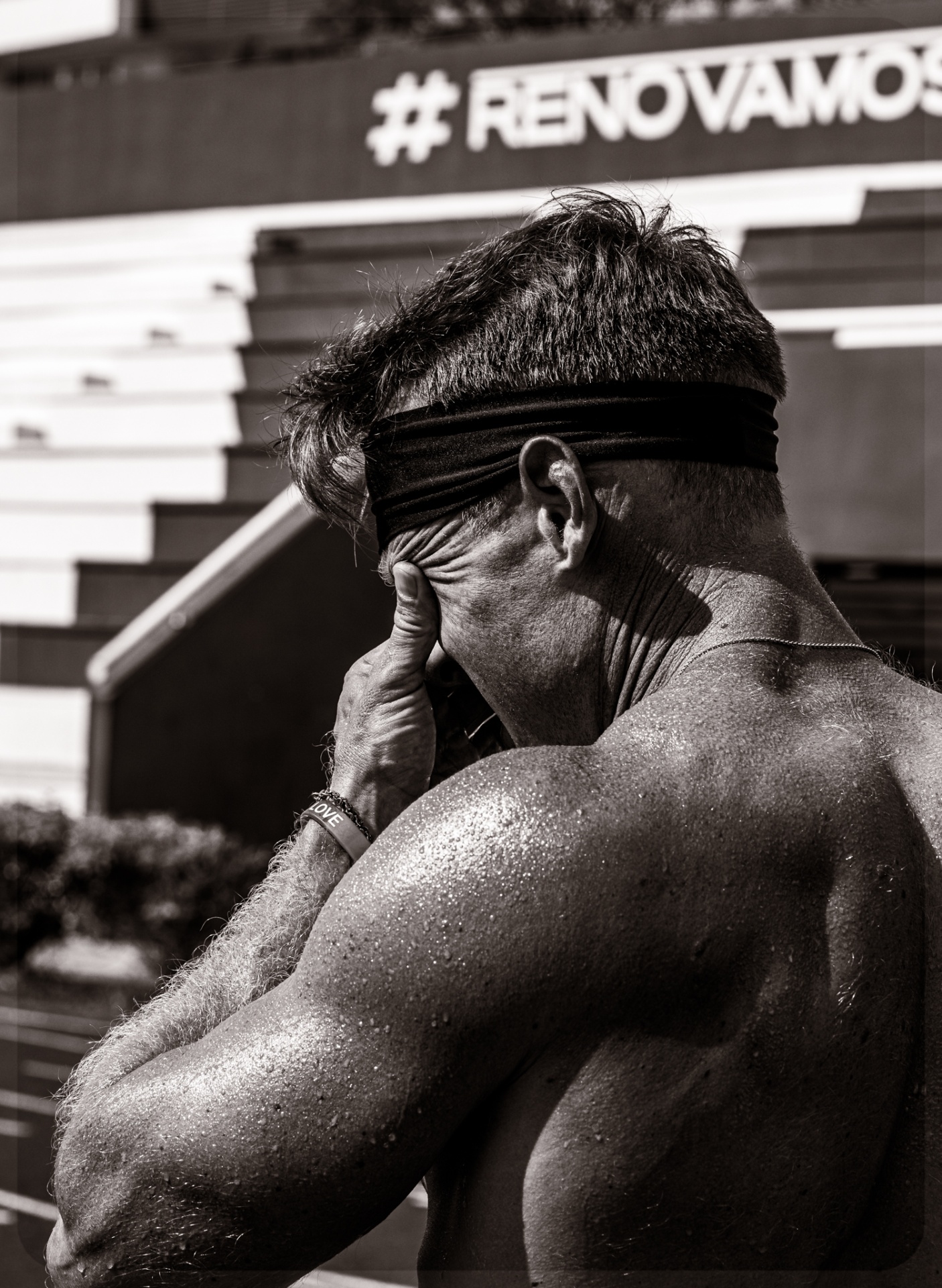Mike Zdonczik on a loaded kettlebell carry across the palapa floor